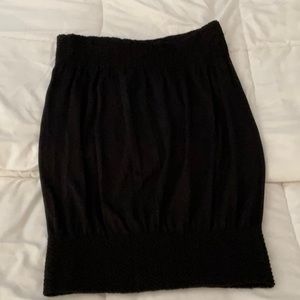 Cute black top, no sleeves, and comes from choices